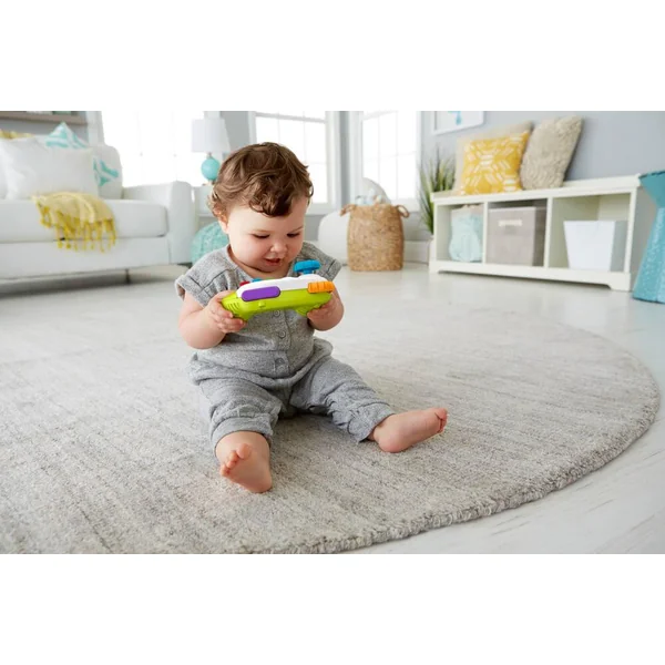 FISHER PRICE - RIRES ET EVEIL® - MANETTE DE JEUX ET D’APPRENTISSAGE - VERTE