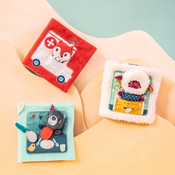 Lilliputiens - livre en tissu avec marionnette à doigt - le loup Ludovic apprend à manger