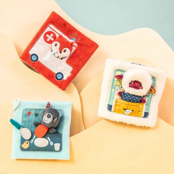 Lilliputiens - livre en tissu avec marionnette à doigt - le loup Ludovic apprend à manger